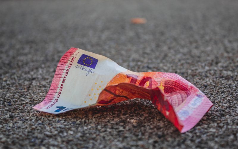 Euro banknote laying on the floor