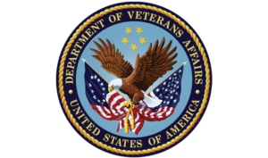 The Seal of the Department of Veterans Affairs eagle five stars American flags