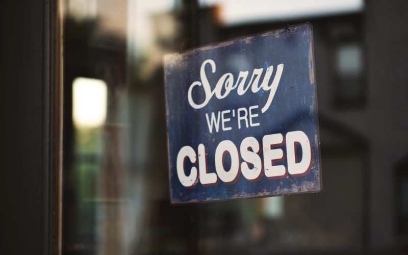 Sorry we're closed sign on the door
