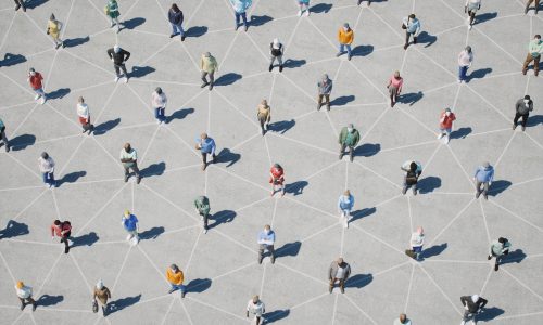 Aerial view of people standing at even distance from each other