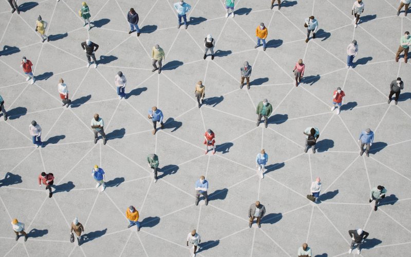 Aerial view of people standing at even distance from each other
